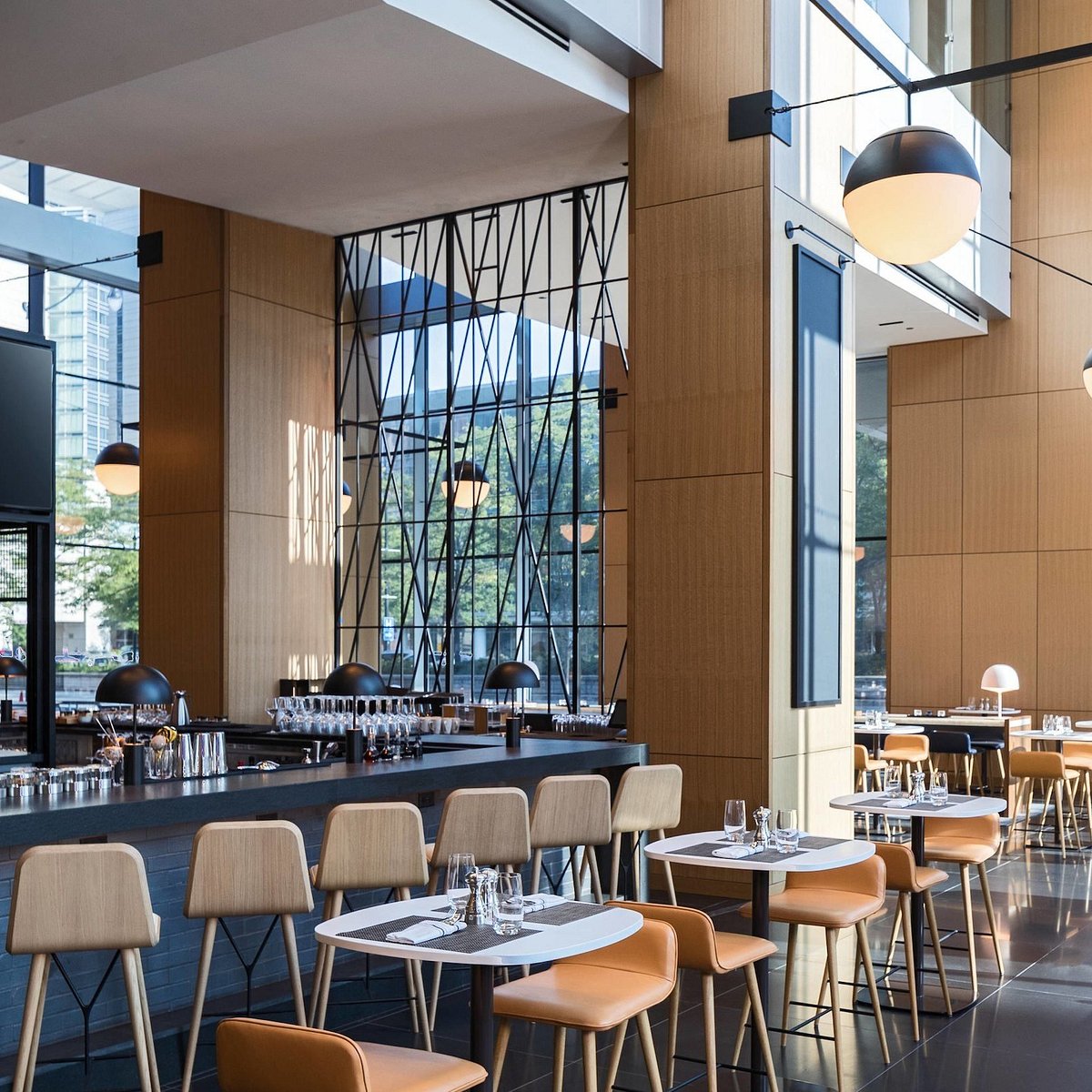 Contemporary Woven + Bound bar and restaurant interior in the Marriott Marquis Chicago